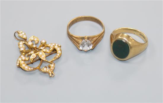 Two 9ct gold rings including bloodstone signet ring and a yellow metal and seed pearl set pendant brooch.